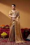 Full-length view of a model wearing an embellished Kanjivaram zari tissue saree.