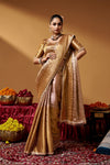 Full-length view showing the saree drape and embellished border.