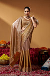 Full-length fashion view of a Kanjivaram zari tissue saree with decorative border.