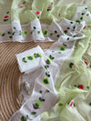 Mint green saree with white floral contrast pallu and lace border