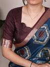 Close-up of the printed Tasar Silk Saree with striped pattern and border.