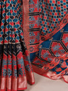 Close-up of the printed Tasar Silk Saree showing the blouse and border fabric.